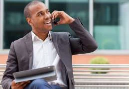 A business professional speaking with a client